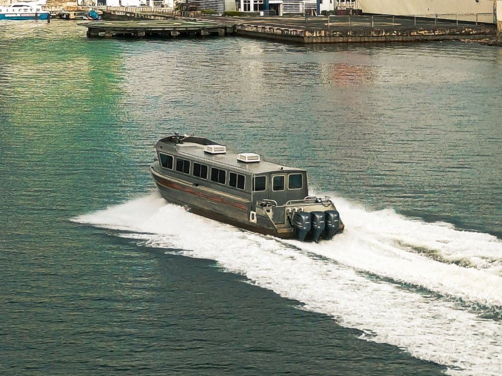 Passenger boat at speed on Lagos Lagoon