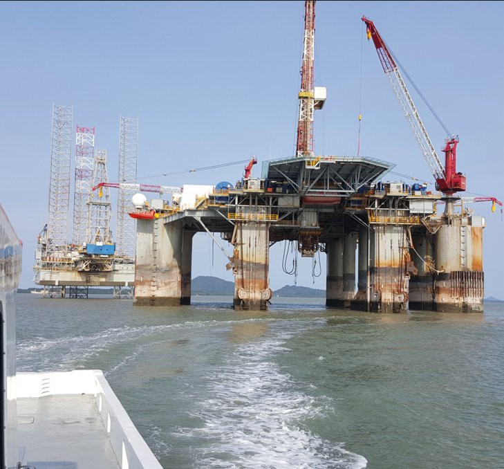 Crew boat approaching offshore rigs